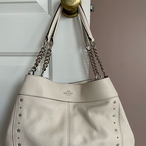 Winter white Coach with silver studs handbag